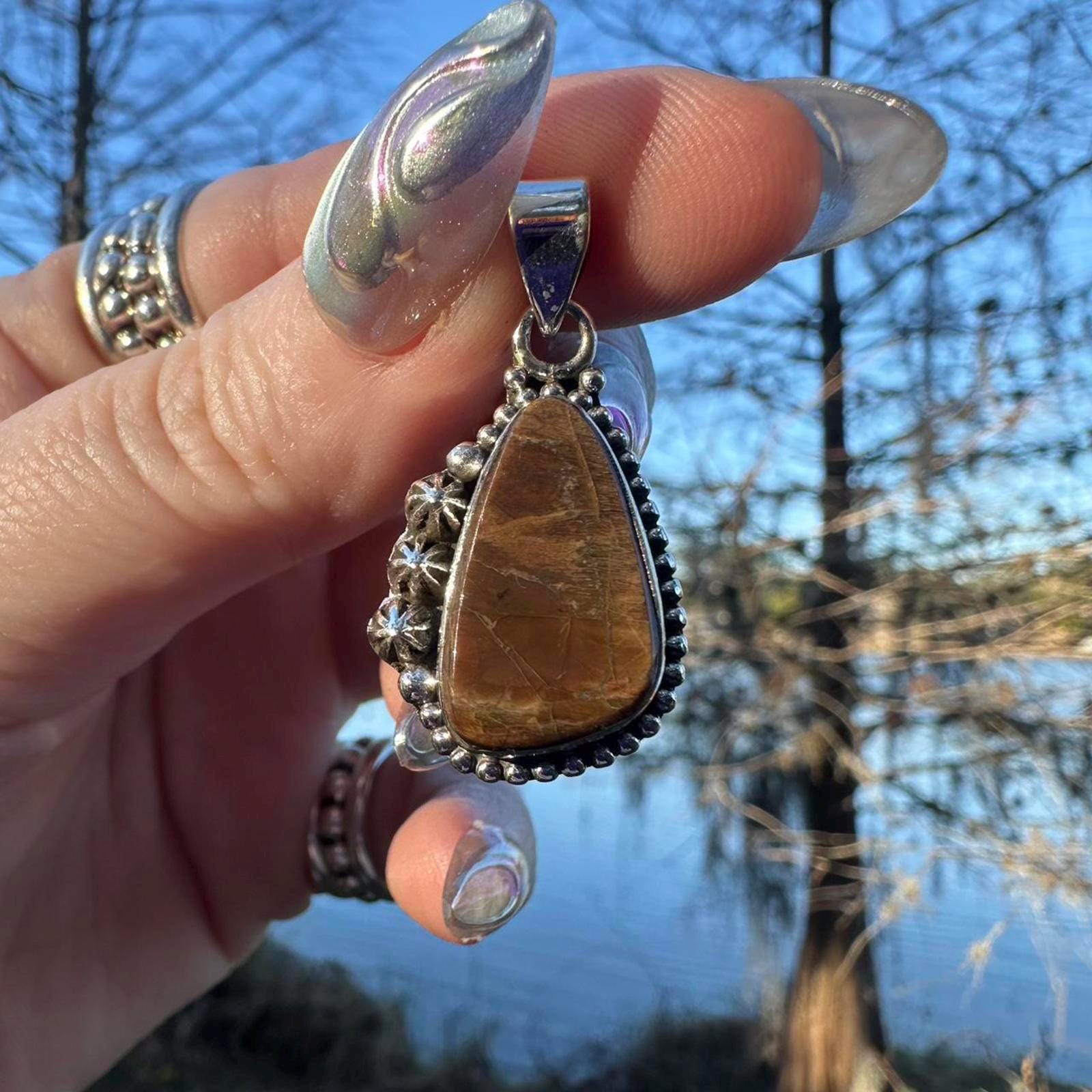 Sterling Silver Ammolite Pendant. Approx 1.5 inches. Yellow/Brown Shift