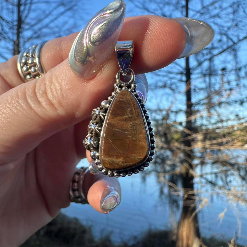 Sterling Silver Ammolite Pendant. Approx 1.5 inches. Yellow/Brown Shift