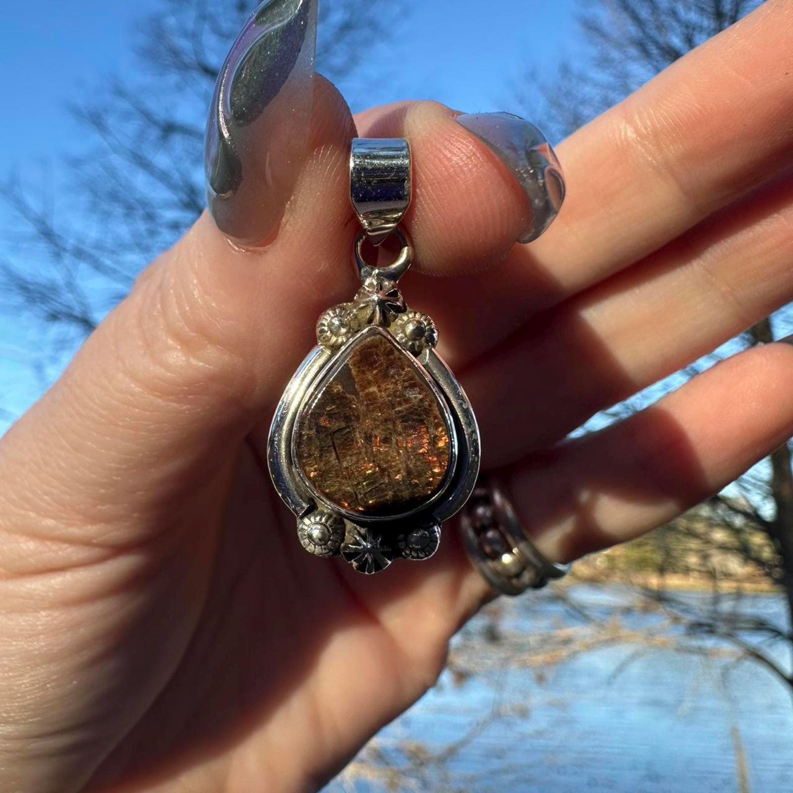 Sterling Silver Ammolite Pendant. Approx 1.5 inches. Red/Brown Shift