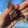 Sterling Silver Ammolite Pendant. Approx 1.5 inches. Red/Brown Shift