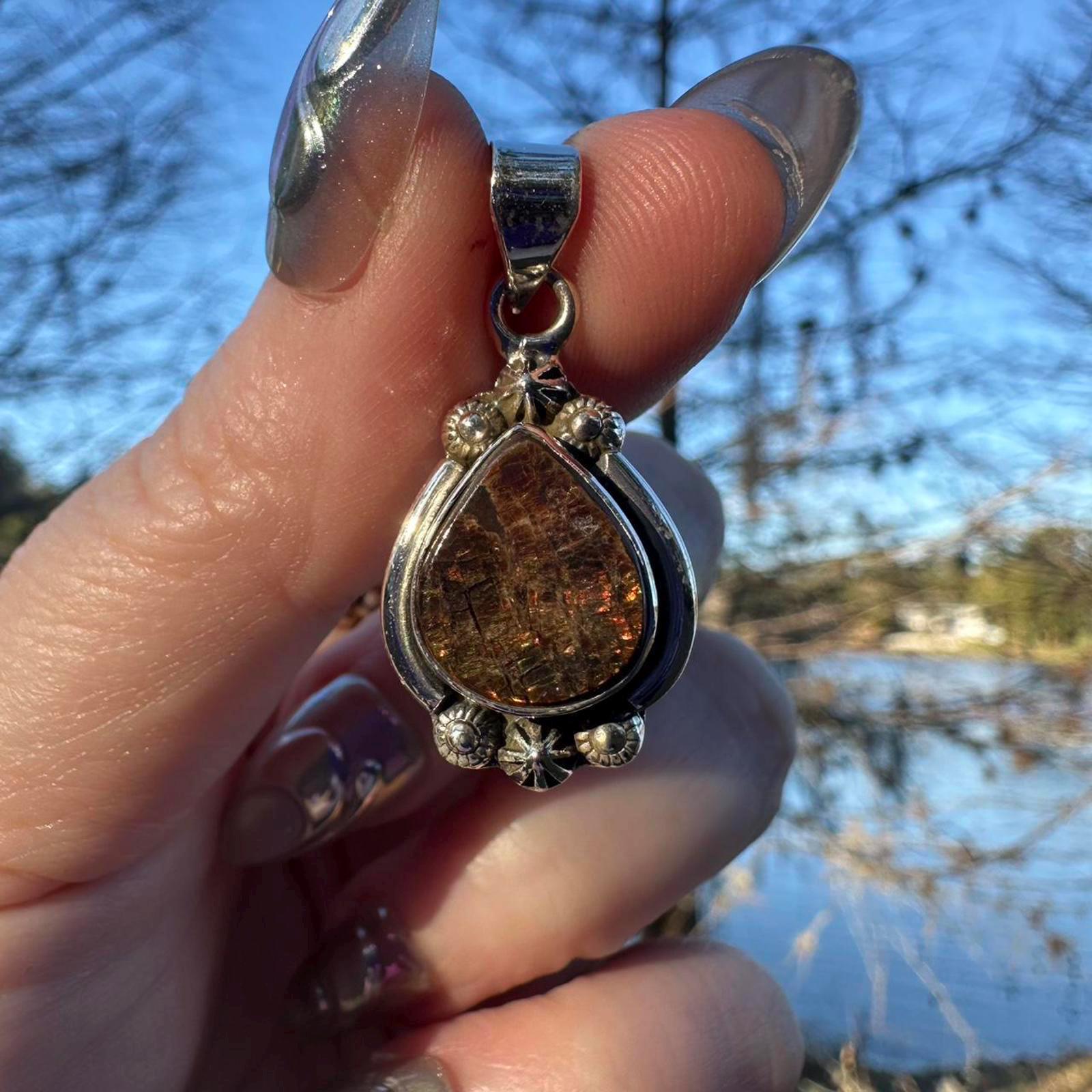 Sterling Silver Ammolite Pendant. Approx 1.5 inches. Red/Brown Shift