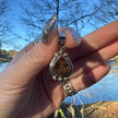Sterling Silver Ammolite Pendant. Approx 1.5 inches. Red/Brown Shift