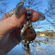Sterling Silver Ammolite Pendant. Approx 1.5 inches. Red/Brown Shift