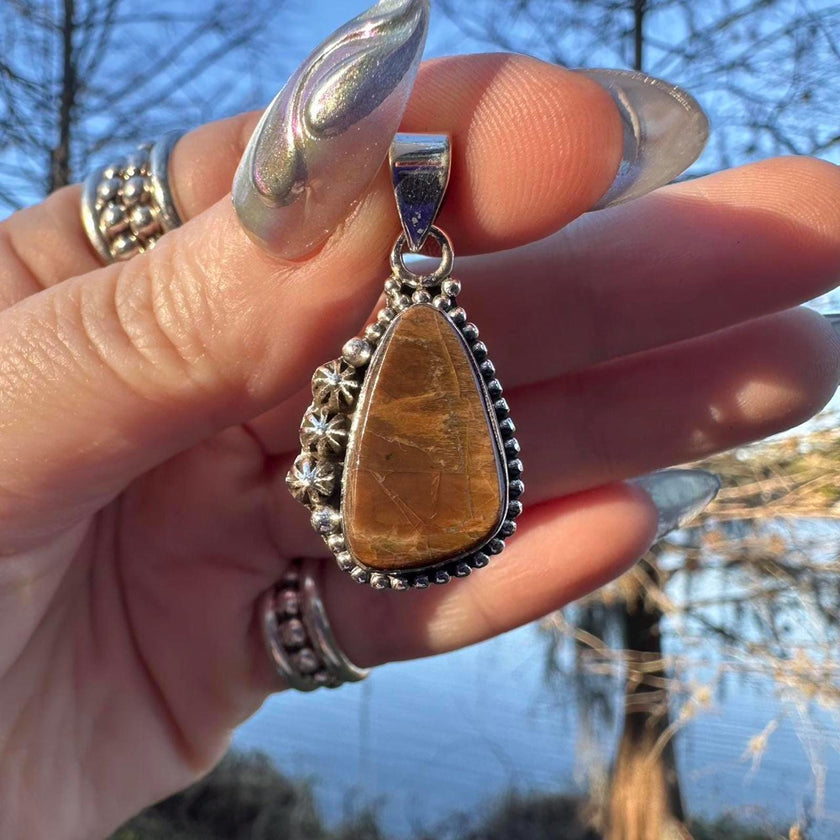 Sterling Silver Ammolite Pendant. Approx 1.5 inches. Yellow/Brown Shift