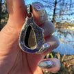 Sterling Silver Ammolite Pendant. Approx 1.5 inches. Yellow/Brown Shift